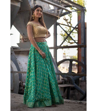 GREEN FULL FLARED LEHENGA WITH OFF SHOULDER BLOUSE